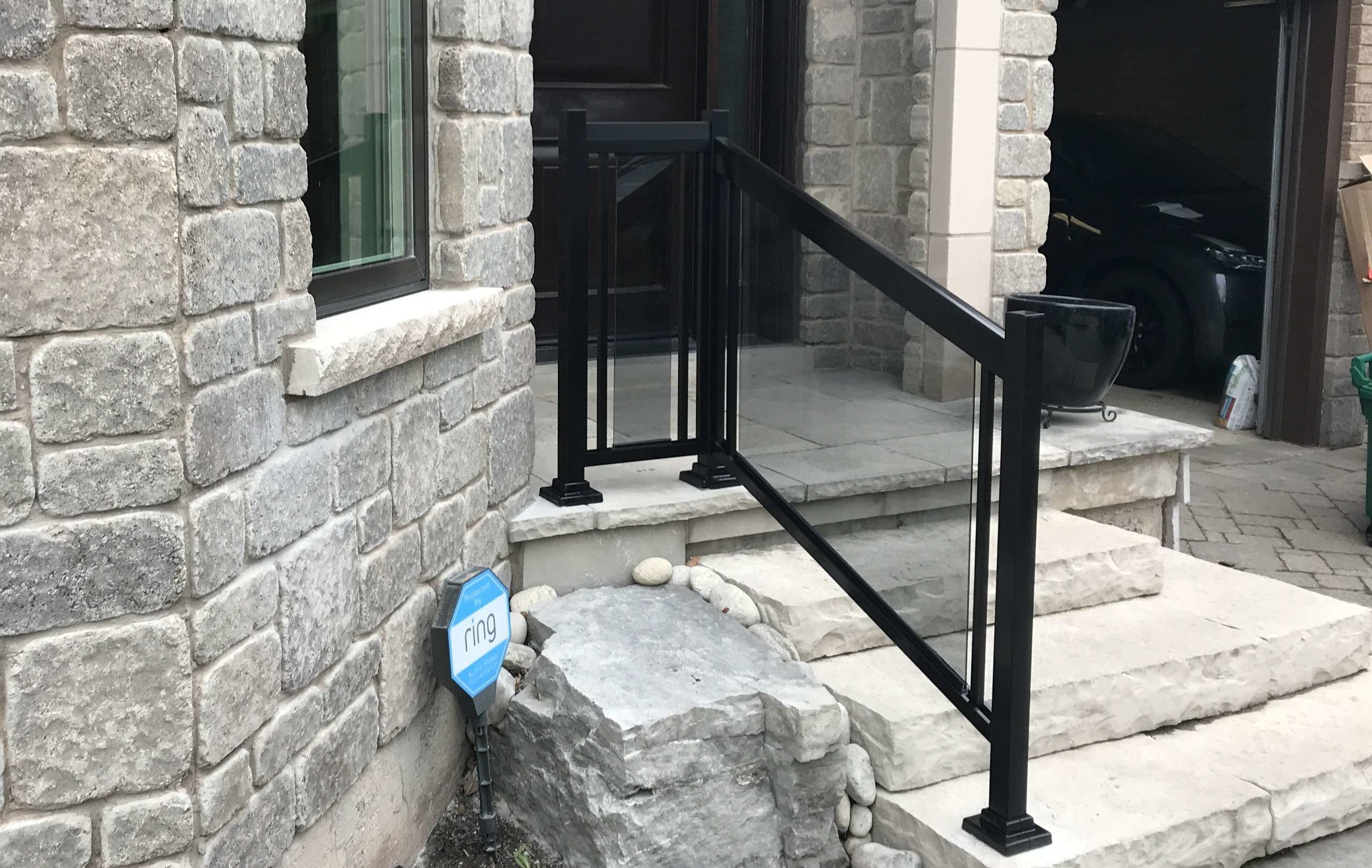 Tinted Grey Glass Railings Installation on Stone-porch (Guelph, ON)