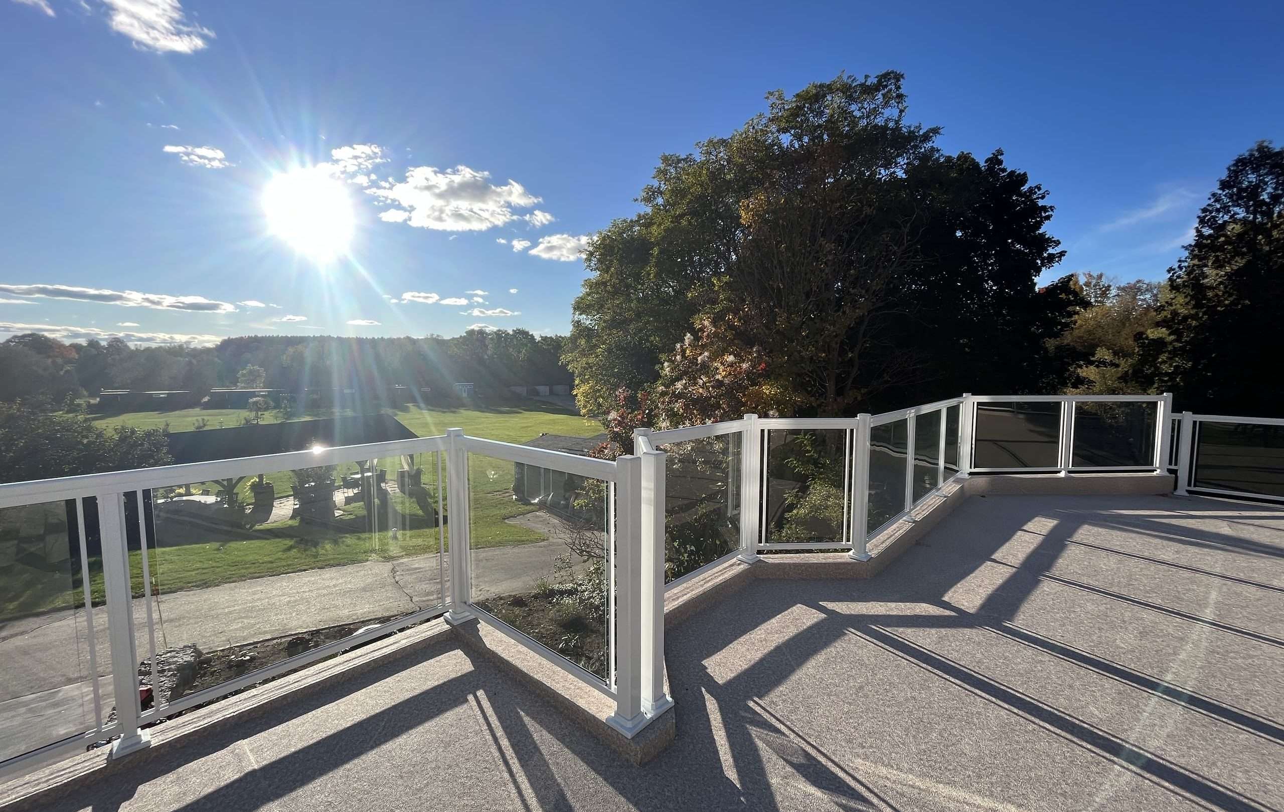 Custom Installation of Vision Clear Glass Deck Railings (Ariss, ON) - WHITE